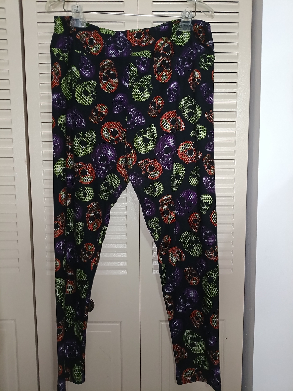 LuLaRoe Black Leggings with Green, Purple & Orange Skulls